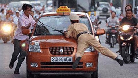 (Ảnh minh họa) Thêm một vụ taxi gây khó dễ với CSGT