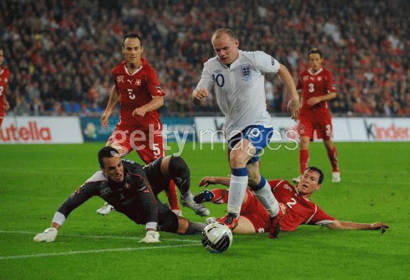 Một pha ghi bàn của Rooney (Ảnh: Getty)