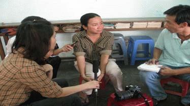 Trả lời báo chí, bà Lê Thị Thanh Lan bác bỏ mọi cáo buộc về việc hành hạ dã man 4 đứa trẻ ở nhà mở tỉnh Đồng Nai. Ảnh: Đ.Đ